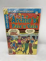 Front cover showing colorful illustration of Archie and friends at a roller rink with dialogue bubbles. "Archie's Pals 'n' Gals" title visible, along with publisher logo and price marking.
