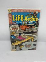 Front cover of Life with Archie #202 comic showing Archie and friends in two vehicles, with speech bubbles.