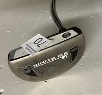 Close-up of the putter's mallet-style head, showing the White Ice branding and model number 340 C.
