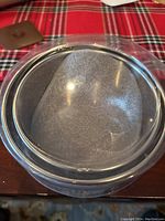 Photo of electric gravy boat with transparent design, showing the lid and container