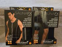 Front view of SaunaTek men's neoprene sauna vest and shorts packaging showing size Large and product features.