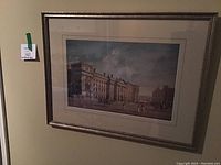 Photo of metal framed art print showing historic Trinity College Dublin scene, artist James Malton