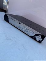 Front top angle view of Bunker Hill Security digital video recorder showing control buttons and ventilation holes on top.