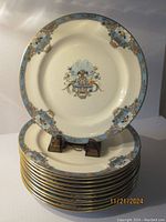 Stacked set of plates with one plate displayed upright