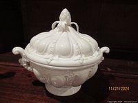 Creamware artichoke-shaped tureen with lid and plate, showing overall shape and detailing