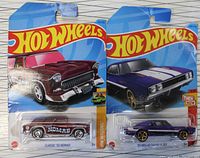 Two Hot Wheels cars in packaging showing Classic '55 Nomad and '69 Dodge Charger 500 together