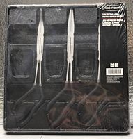 Photo of the 3-piece extra long pistol grip plier set in its packaging, view showing three pliers with pistol grip handles and long nose types.