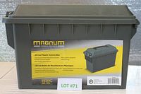 Front and side view of green Magnum 30 Cal plastic ammo box showing label and lid lock