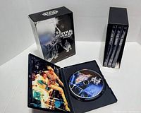 Outer slipcase, open case showing Episode VI disc and artwork, additional DVD cases inside slipcase