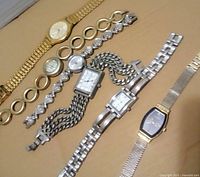 All six wristwatches laid out for overview