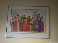 Framed serigraph print "The Party" signed by John Lim, showing the entire artwork horizontally hung on a beige wall.