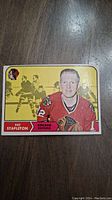 Front of 1968 OPC Pat Stapleton hockey card showing player photo, team logo, and position.