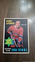 Front of the 1970 OPC Jacques Laperriere All Star hockey card showing player in Montreal Canadiens uniform with All Star graphics.
