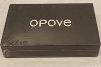 Front of sealed black box with Opove branding in white text.
