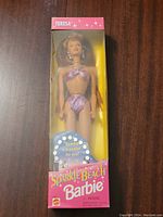 Front view of Teresa Sparkle Beach Barbie doll in sealed box showing doll and packaging details