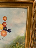 Close-up of balloon area showing enamel loss and chipping damage in the painted enamel surface.