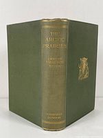 Front view of book spine and covers showing title, author's name, publisher and gilt muskox head illustration on front cover.