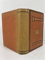 Front and spine view of the hardcover book showing title and publisher on spine.