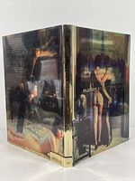 Photo of front and back cover showing nude women in artistic poses, reflecting typical Helmut Newton photographic style and Playboy theme.