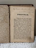 Front inside page showing preface and handwritten inscription of previous owner's name and location.