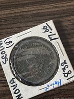 Front side of the 1832 Nova Scotia penny displaying the text 'Province of Nova Scotia' with a figure's profile.