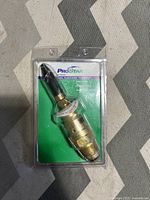 Front view of ProStar helium balloon inflator in sealed plastic packaging.