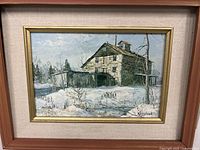 Framed rural house scene in winter with snow, signed Kiersted