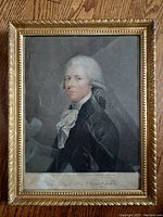 Frontal photo of framed black and white portrait of William M. Pitt, showing detailed face and attire with inscription below.