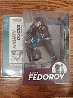 Front view of Sergei Fedorov figurine in original packaging with visible branding and player details.