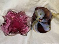 Photo showing both cranberry swirl art glass bowl and vintage Wales art glass candy bowl