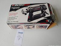 Original box of RotoZip Spiral Saw tool showing product image and branding