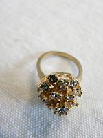 Close-up of 18kt gold plated ring with cluster of crystals