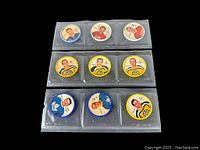 Nine hockey coins in protective plastic sleeve sheets shown, featuring colorful team backgrounds and portraits of NHL players from 1961-62 season.
