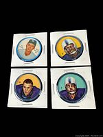 Front side of four vintage sports coins featuring illustrations of players Billy Gardner (Yankees), Jim Roundtree, Art Johnson, and Jim Andreotti (Toronto Argonauts) mounted on white cardboard holders.