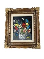 Framed oil painting on board showing entire artwork and frame, flowers in colorful palette in vase, signed on bottom left.