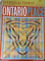 Full front view showing title text and geometric design