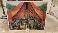 Front view of the two-panel Manitoba party tent scene showing overall artwork and metal frame.
