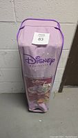Packed Disney Princess Junior BYO Bed in purple carrying case, clearly showing logo and branding.