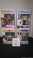 Lot of 4 Funko Pop figures including Whitney Houston Diamond series #70, The Leftovers Matt #465, My Hero Academia Deku #247, and Tekken Nina Williams #474.