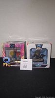 Two Q-Fig collectible figures in original packaging: Doctor Strange and Rocket & Groot