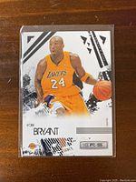 Front of 2008-09 Panini Kobe Bryant basketball trading card showing player image and design details.