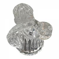 Top-down angle showing clear glass angel with detailed wings and gown holding a candle holder.