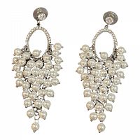 Front view of the pair of dangle earrings showing rhinestone stud tops and cascading faux pearl teardrop arrangement