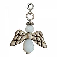 Front view of sterling silver angel pendant with white faceted beads showing detailed wings and the loop for attachment