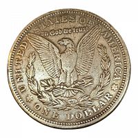 Front side of lapel pin showing detailed eagle design and inscriptions from Morgan silver dollar
