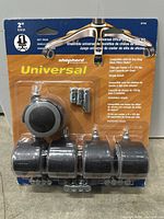 Photo shows a 4-pack of Shepherd Universal Office Chair Casters with 2-inch black wheels and metal stems on original yellow and black packaging. Packaging information includes compatibility and weight details.