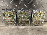 Three holographic Magneton Surging Sparks Pokémon cards in protective sleeves placed side-by-side on a textured metal surface.