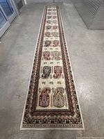 Full-length view of runner rug on concrete floor showing overall pattern and proportions