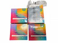 Four boxed Oodelz Fun dual action balloon pumps arranged in a square. Three boxes are new and one is opened but sealed.