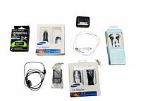 Lot contents showing two Samsung car adapters, three sets of headphones, a Duracell AAA battery pack, and a small black accessory.